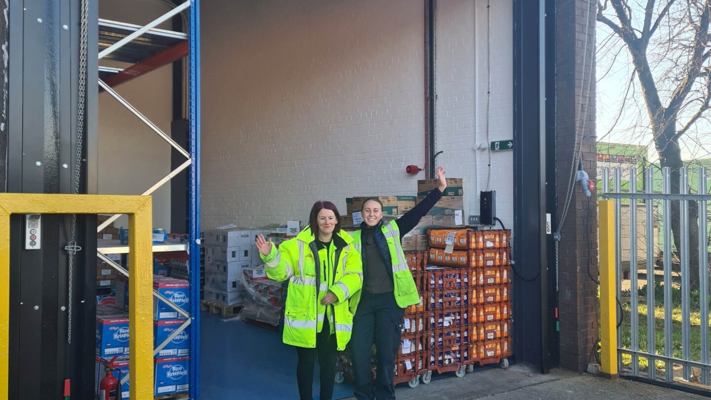 team outside food warehouse